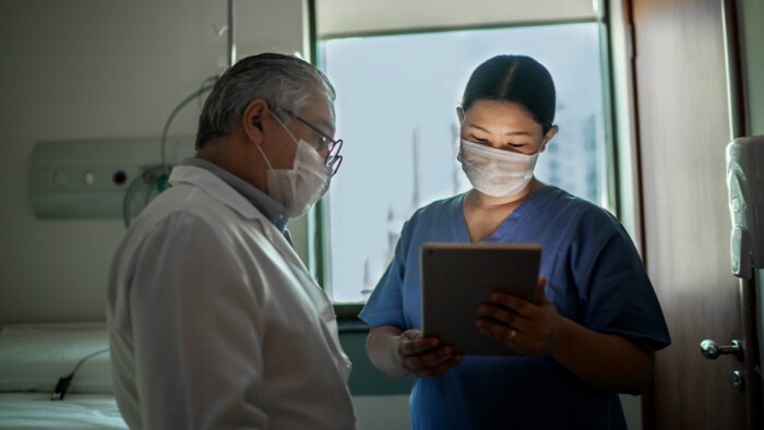 Doctor and nurse discussing