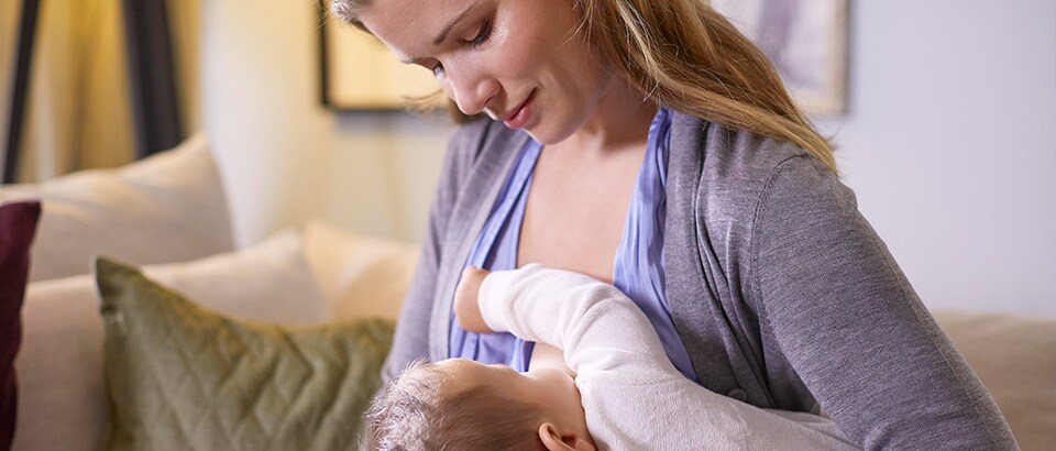 Mom breastfeeding baby